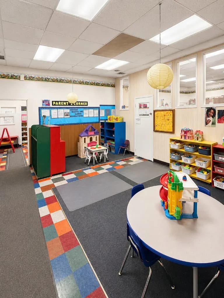 The parents corner at Ideal Daycare with information boards and seating